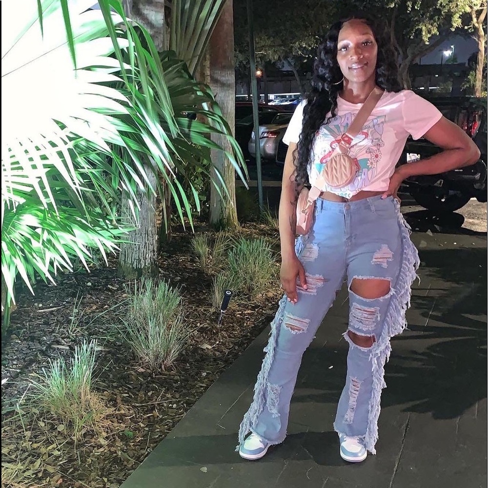 Distressed, fringe jeans